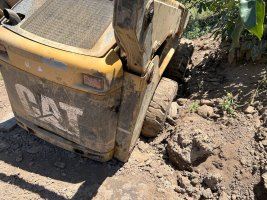 Stuck Skid Steer.jpg