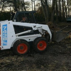 My 743B bobcat 743b side view logging.jpg