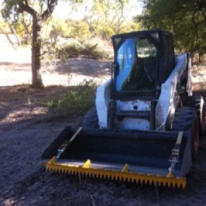 S 220 Bobcat ratchet rake.jpg