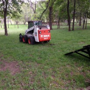 S 220 Bobcat skidding.JPG