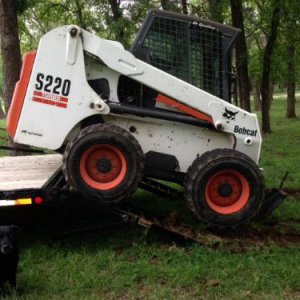 S 220 Bobcat stuck on ramp 1.JPG