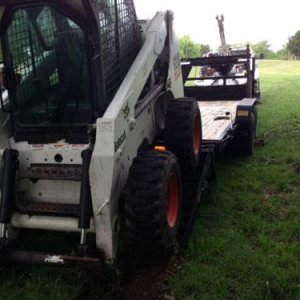 S 220 Bobcat stuck on ramp 2.JPG