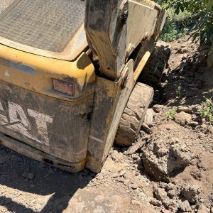 Stuck Skid Steer.jpg